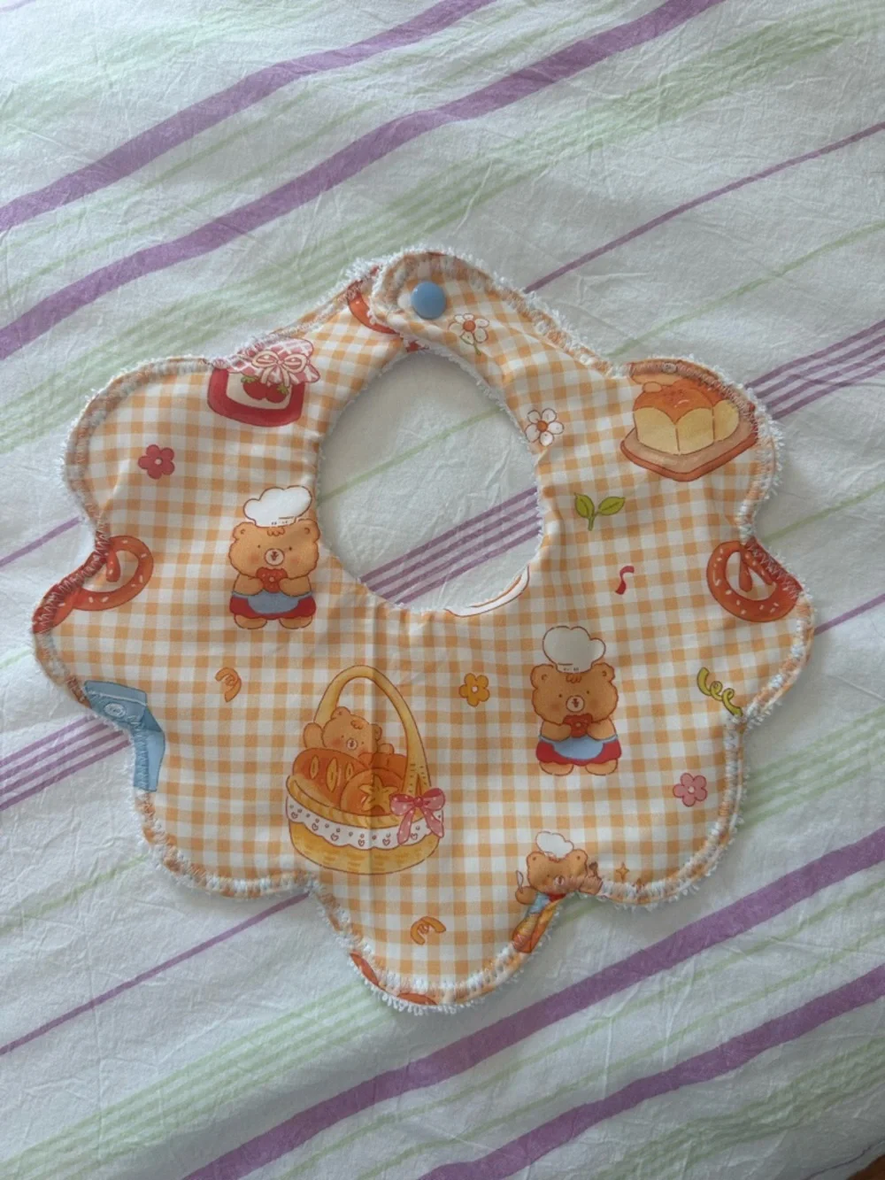Baby Floral Scalloped Bib in Orange Gingham